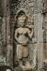 A sandstone sculpture of Apsara at Ta Som Temple in Siem Reap Angkor Wat, Cambodia.