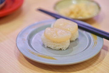 Close up raw scallop sushi