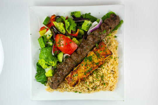 Chicken kebab and kofta with rice and rice. Middle Eastern dish. 