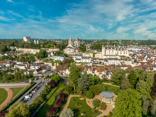 Fototapeta na wymiar Aerial panorama view of Loches in Indre-et-Loire in the Loire Valley in France with massive Norman keep with double enclosure, semi circular towers, Renaissance palace, multiple medieval gates
