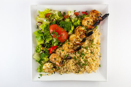 Shrimp Skewer with salad. 