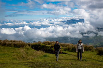 Hikers above the clouds in the andes