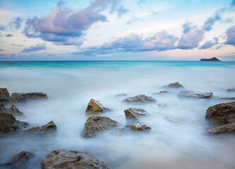 Fototapeta na wymiar Floating Rocks in Oahu Hawaii Waimanalo Beach