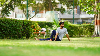 Fototapeta premium man practicing yoga in India