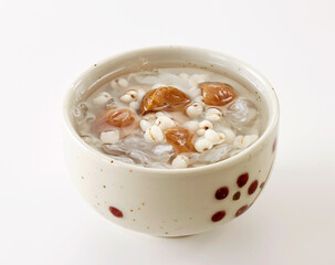 Delicious Chinese dessert, chestnut barley and white fungus syrup .on white background
