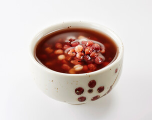 Delicious Chinese dessert, red bean syrup .on white background