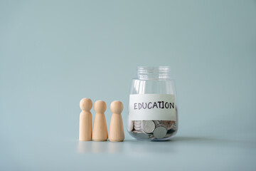 Savings coins jar for education and human faceless figures concept as student save for school admission fees.