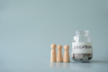 Savings coins jar for education and human faceless figures concept as student save for school admission fees.