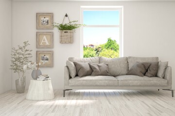 White living room with sofa and summer landscape in window. Scandinavian interior design. 3D illustration