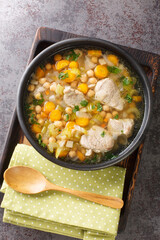 Italian Minestra dei morti or soup of the dead, is traditionally eaten for the Day of the Dead closeup. vertical top view from above