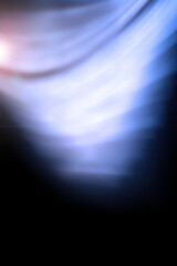 Abstract blue background. Blurred background with curved lines blue tint.