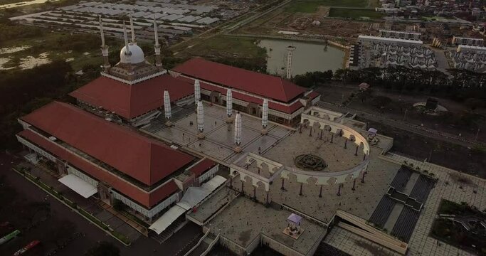 Aerial view of the great Mosque of Central Java (MAJT) in suset time. Th sun is orange and the weather is cloudy. Masjid Agung Jawa Tengah the one of the icon of Semarang City