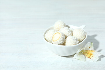 Concept of tasty sweets, coconut candies, space for text