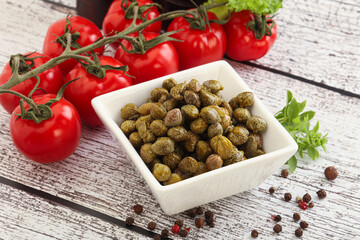 Marinated green capers in the bowl