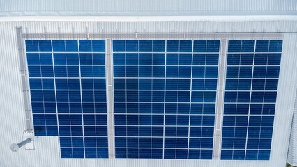 Solar power panels on the roof for green energy. Solar panels on factory roof photovoltaic solar...