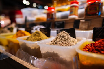 Colorful spices at a market for sale, close up