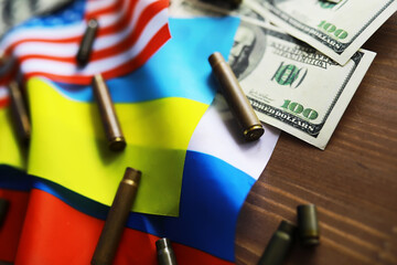 Naklejka premium The concept of support in a military conflict. Solidarity. Politics. The flags are on the table.