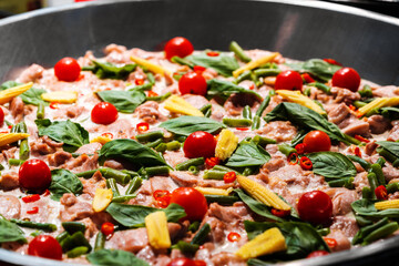 Asian street fast food in hot pan