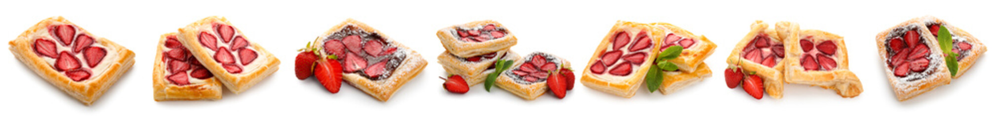 Set of sweet strawberry puff pastries on white background