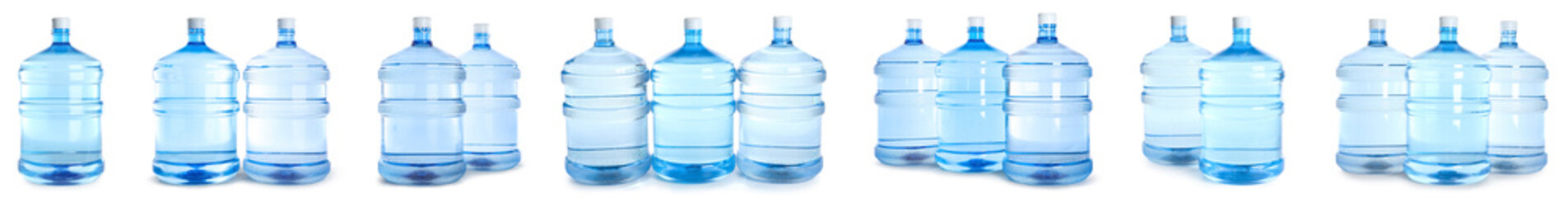 Set of many bottles of clean water isolated on white