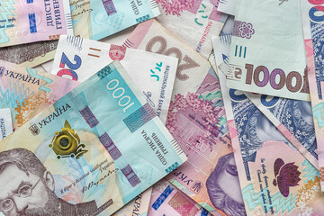 a large amount of bribes in Ukrainian currency is on the table after their withdrawal.