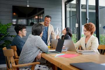 Candid of people office meeting.