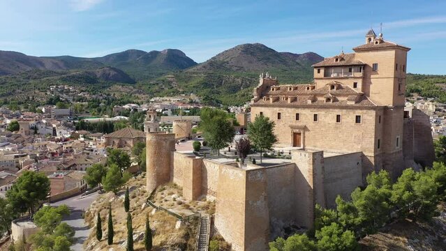 View from drone of historic center of Spanish city of Caravaca de la Cruz overlooking ancient fortified Castle and Basilica of Vera Cruz, region of Murcia