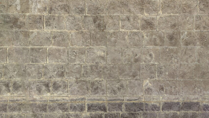 Photo of cement block on floor.