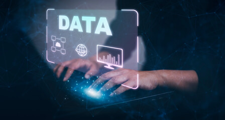 Businessman using a laptop with Analytics and Data Management System on the computer, Hands working on a laptop cloud network graphic overlay, connected to the database. Corporate strategy for finance