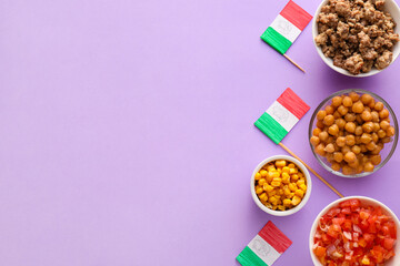 Composition with Mexican traditional food and flags on purple background