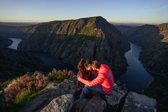 Couple embracing on top of mountain at river Sil