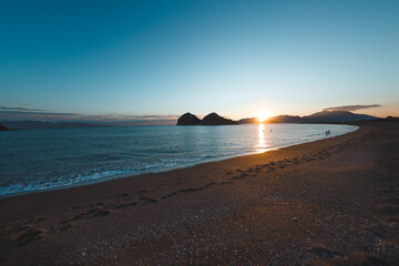 A beautiful seascape, a beach in the sunset light