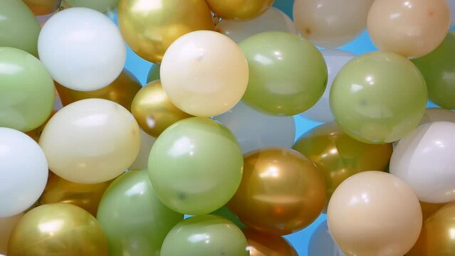 Background balloons with confetti, festive background for copy space, colorful balloons for birthday or anniversary.