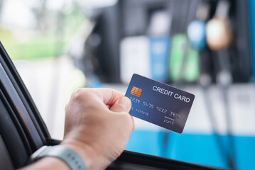 Credit card to make a payment for refueling car on gas station