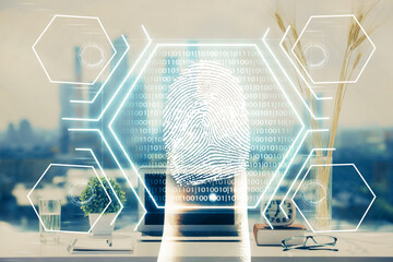 Computer on desktop in office with finger print drawing. Double exposure. Concept of business data security.