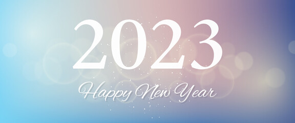 Happy new year 2023 incription on blurred background