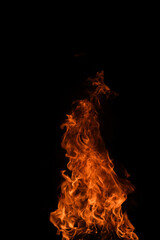 Texture of fire on a black background. Abstract fire flame background, large burning fire.