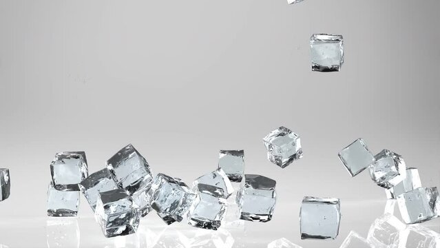 Ice cubes falling 4k footage