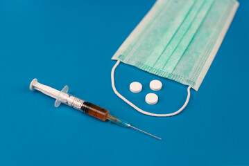 medical protective face mask and syringe with hand sanitizer