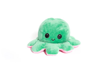 Plush green Octopus Toy Isolated on White. 