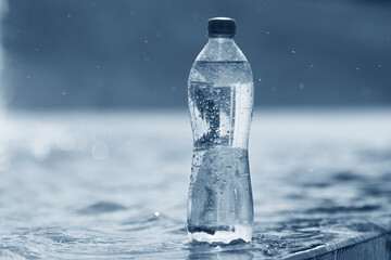 bottle of water in blue tones