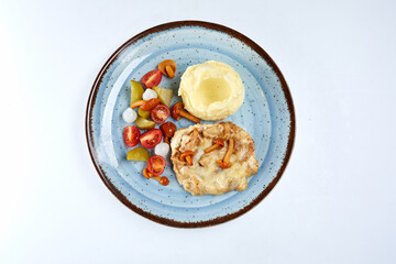 pork with mashed potato and vegetables
