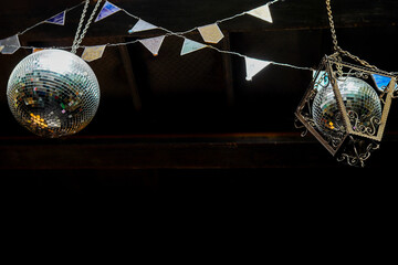 Mirror disco ball with silver decoraions. retro Club style interior