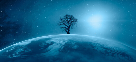 Global warming concept - Silhouette of tree over the earth  