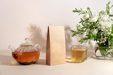 Tea branding and packaging mockup. Blank tea packaging mockup with tea. Kraft paper pack  and empty...
