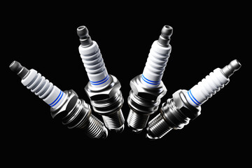 Silver spark plugs on black  background. 3d illustration. Car Repair Parts