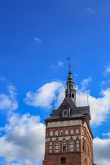 Fototapeta na wymiar Medieval tower against the sky in Danzig, Poland