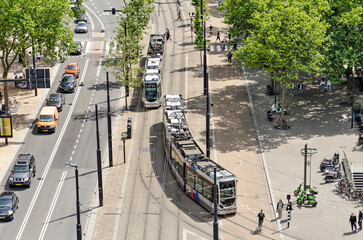 Rotterdam, The Netherlands, June 2, 2022: aerial view of Coolsingel boulevard with two RET trams passing each other