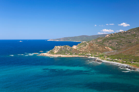 View along the Mediterranean Sea coastline from hillside path near Pointe de la Parata, Ajaccio, Corse-du-Sud