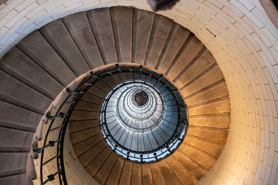 Spiral staircase from below in the Eckmuhl Lighthouse in Brittany